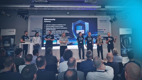 The picture shows the speakers of the Cybersecurity Day on stage during the Q&A session.