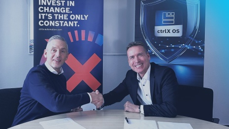 Representatives from Grossenbacher Automation and Bosch Rexroth seal their partnership for ctrlX OS with a handshake.
